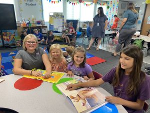 Picture of 4th grade and Kindergarten