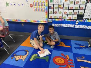 Picture of 4th grade and Kindergarten