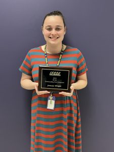 Teacher Janaya Wright pictured with award